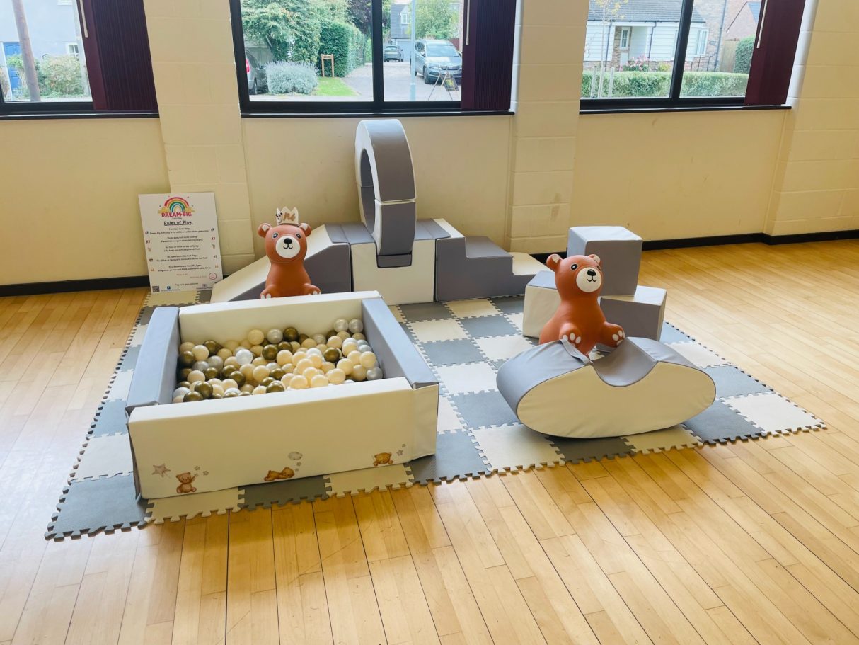 Grey and white softplay with neutral ball mix (cream,pearl and gold), teddy bear hoppers, themed accessories and stickers.
